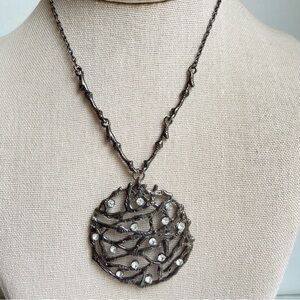 Cookie Lee signed gunmetal tone pendant necklace with rhinestones and branches